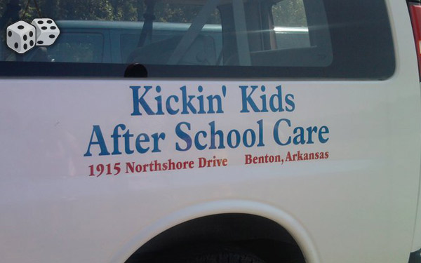 White van side view with blue text 'Kickin' Kids After School Care' and address