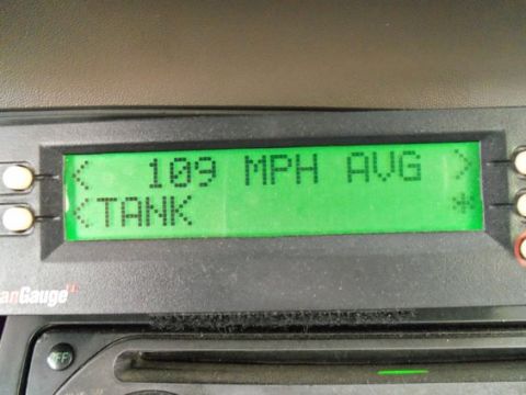 2000 Mercury Grand Marquis - A digital gauge displays average speed and fuel tank status.