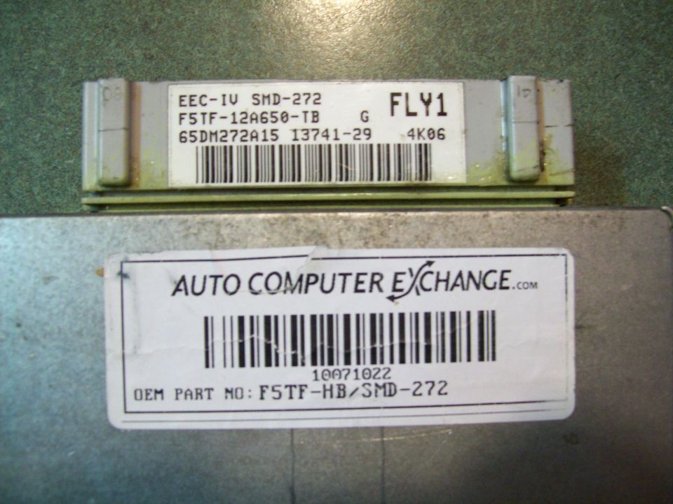 Engine control module with labels EEC-IV SMD-272 and F5TF-12A650-TB, and AUTO COMPUTER EXCHANGE.com label