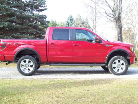 1978 Ford F-150 - This red pickup truck is a modern model, not a 1978 Ford F-150.