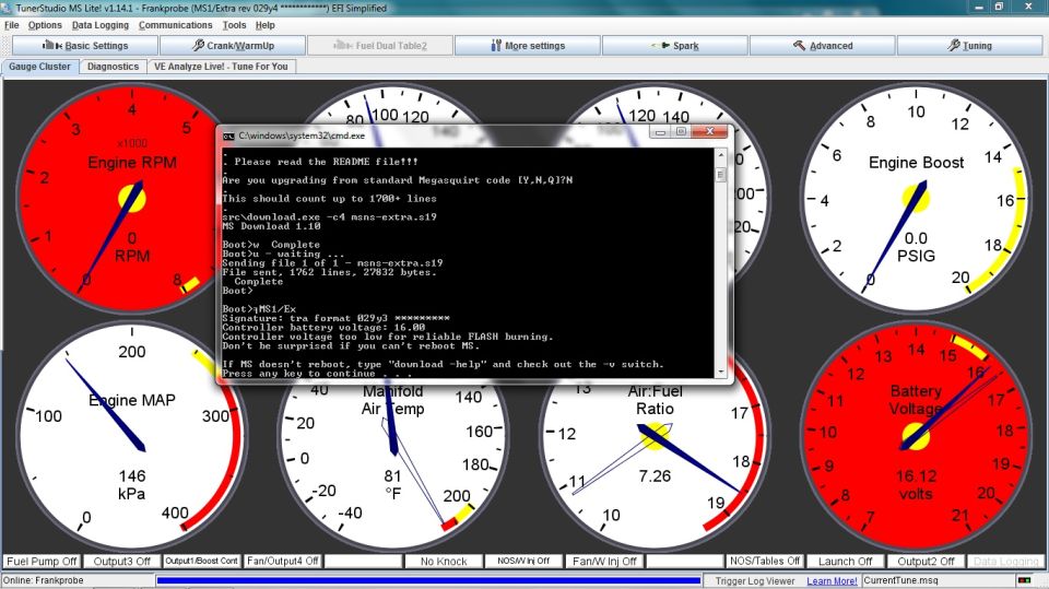 Computer screen with engine gauges and command prompt showing upgrade progress