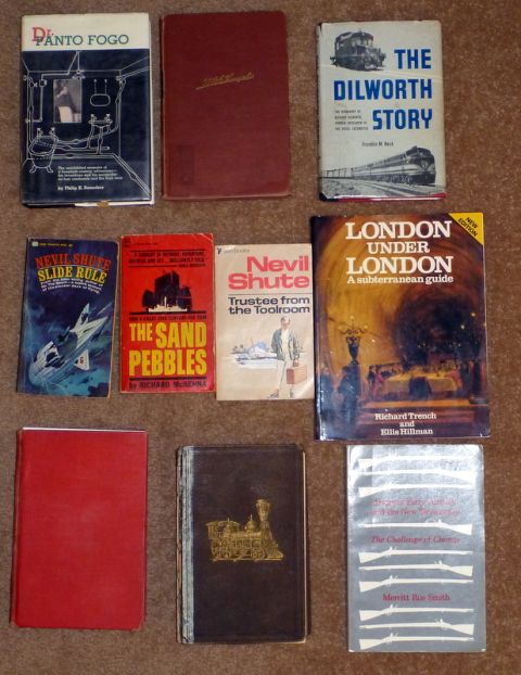 1969 Lincoln Continental - A variety of books are displayed, different subjects and authors.