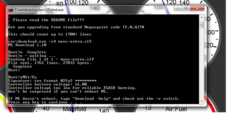 Computer screen showing command prompt text and vehicle gauges