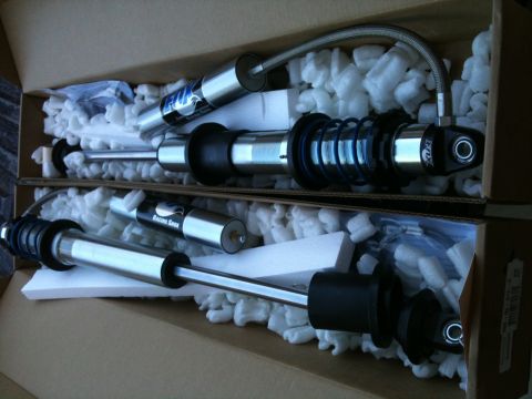 1966 Ford Bronco - Two new Fox Racing Shox shock absorbers are shown packed in their original boxes.