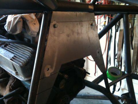 1966 Ford Bronco - Custom fabrication work on an engine and roll cage is shown in this close-up view.