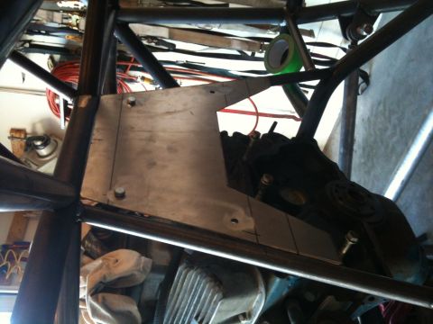 1966 Ford Bronco - Custom roll cage and engine components are visible in this close-up shot.