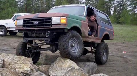1988 Ford Bronco - A heavily modified 1987 Ford Bronco navigates a rocky obstacle course.