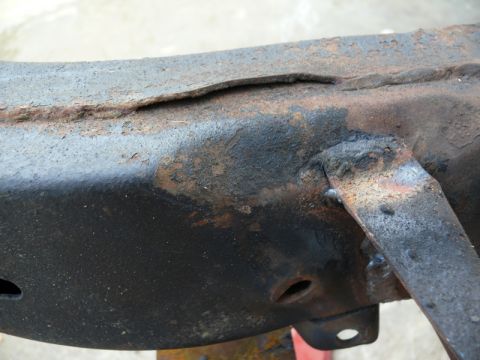1976 Chevrolet Corvette - This image shows a heavily rusted frame section with a weld, not a 1976 Chevrolet Corvette.