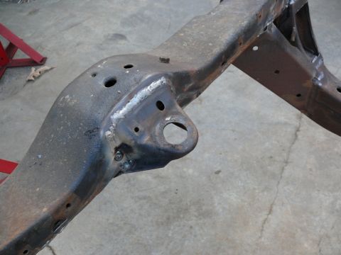 1976 Chevrolet Corvette - This is a section of a car's frame, showing signs of rust and recent welding work.