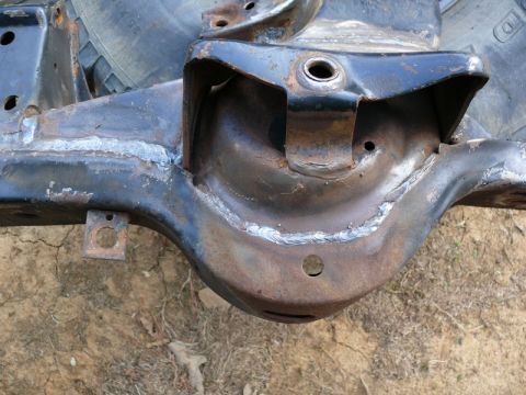 1976 Chevrolet Corvette - Close-up view of a Corvette frame section, showing areas of repair with visible welds.
