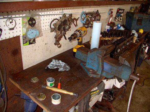 1983 Chrysler Fifth Avenue - Valve lapping time again. There's the course and fine lapping pastes on the bench in front of the Record vice.