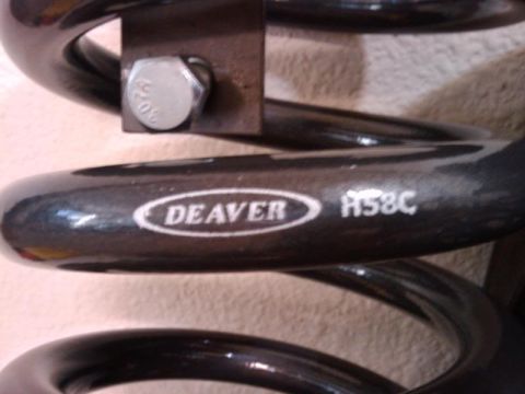 1995 Ford Bronco - Close-up of a Deaver suspension spring, showing the brand name and a part number.