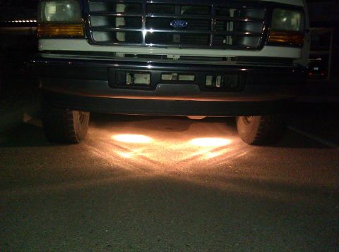 1995 Ford Bronco - Front view of a 1995 Ford Bronco, highlighting the grille and bumper with illuminated underglow lights.