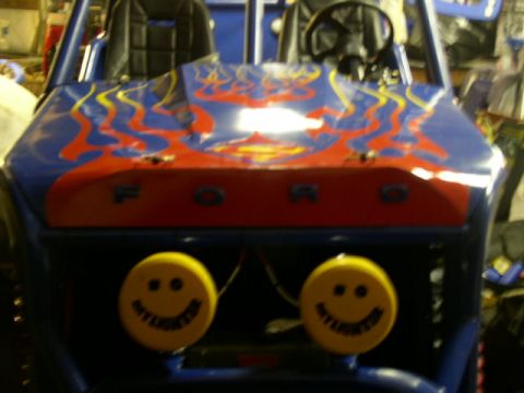 1979 Ford Bronco - This custom buggy features flame decals on the hood and smiley face headlights.