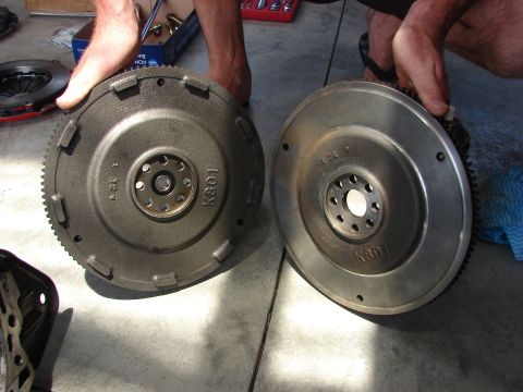 1993 Mazda MX-3 - Front view for comparison. Lightened Flywheel on Right showing amount of material removed. See side view photo for comparison