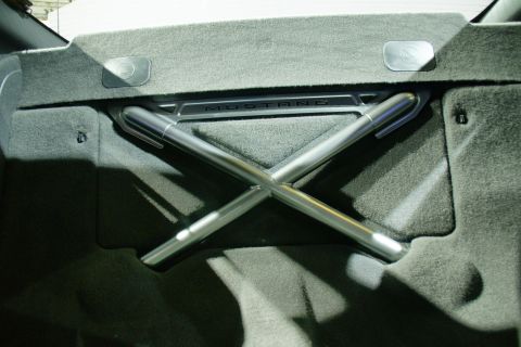 1993 Ford Taurus - A structural brace labeled 'MUSTANG' is visible in the trunk area of a vehicle.