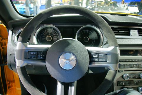 1993 Ford Taurus - Interior view of a car, showing the steering wheel and dashboard controls.