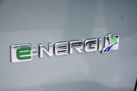 1993 Ford Taurus - Close-up of an 'e-NERGI' badge, indicating an energy-efficient or electric vehicle.