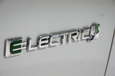 1993 Ford Taurus - Close-up of an "ELECTRIC" badge on a vehicle's exterior.