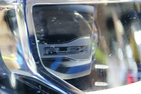 1993 Ford Taurus - The 'FLEX' badge is visible on a car part, not a 1993 Ford Taurus.