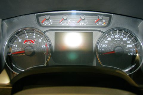 1993 Ford Taurus - The dashboard displays a tachometer with an FX logo and a speedometer, indicating it is not a 1993 Ford Taurus.