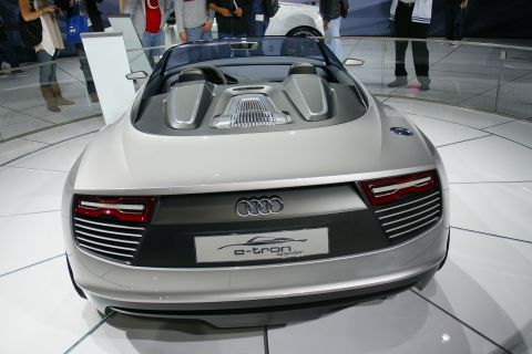 1993 Ford Taurus - The Audi e-tron Spyder concept car is shown from the rear at an auto show.