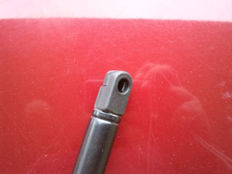 1998 Ford Crown Victoria - This photo shows a hood strut mount, not a 1998 Ford Crown Victoria.