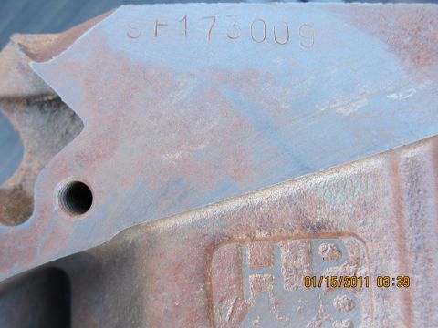 1969 Ford Mustang - A close-up view of a metal component showing a stamped serial number and a date/time watermark.