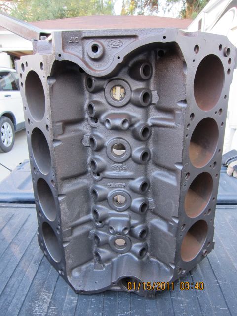 1969 Ford Mustang - Ford V8 engine block shown from the side, with casting marks visible.