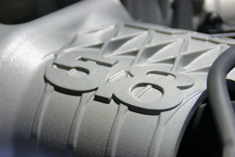 1993 Ford Taurus - Engine intake manifold casting shows "5.8" designation.