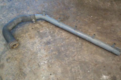 1987 Ford Bronco - Coolant pipe with attached rubber hose, likely from an engine bay.
