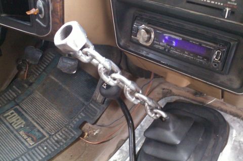 1987 Ford Bronco - A custom chain shift knob is installed in this Ford truck, which also features an aftermarket Kenwood stereo.