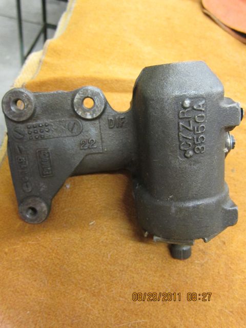 1969 Ford Mustang - This gray metal part, identified by casting numbers CC7ZR 3550A and DIF, is a component of a steering gear box.