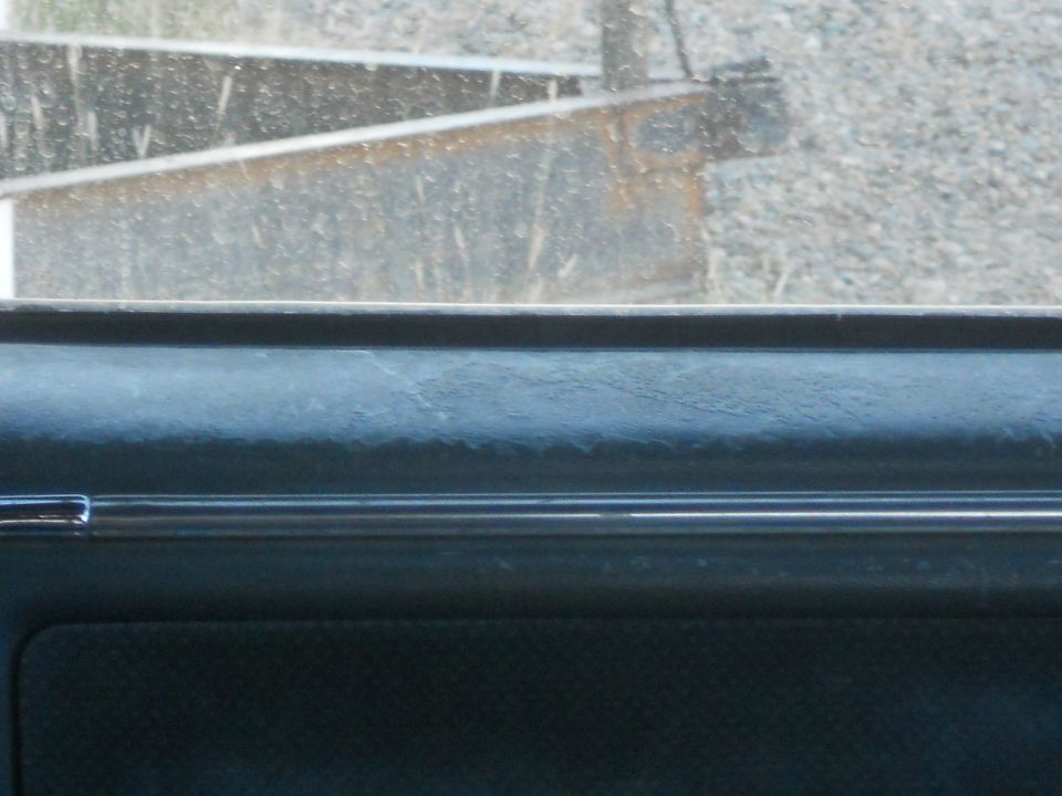Interior dashboard trim with chrome accent strip
