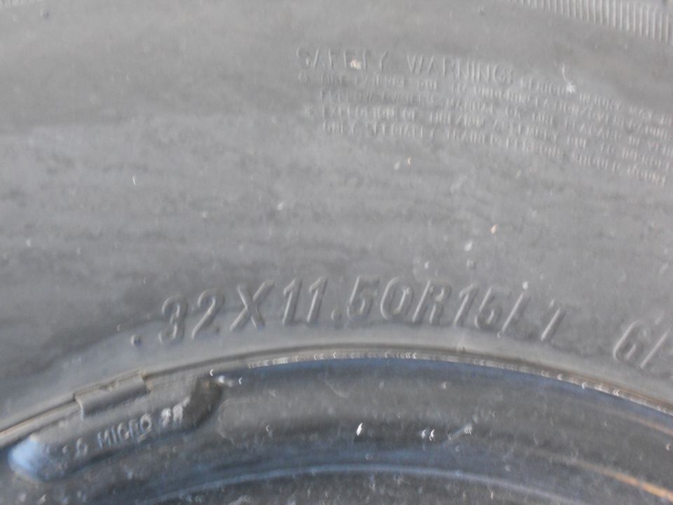 Tire size 32X11.50R16/1.7. Also shows 'SAFETY WARNING' text