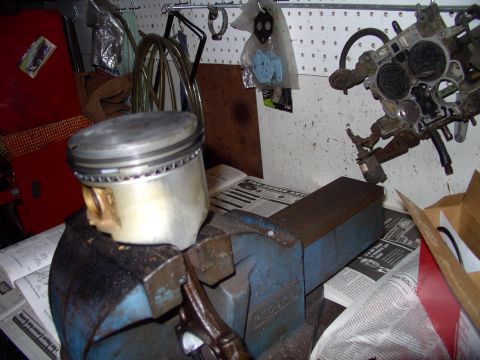 1983 Chrysler Fifth Avenue - New rod bearings to be installed and seven more to go. Grease bearings, submerge pistons upside down in oil and ready to install.