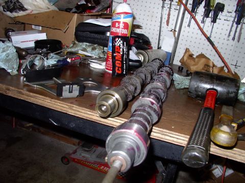 1983 Chrysler Fifth Avenue - Comp Cams lube all over the lobes of the new RV cam. A long water pump bolt inserted into the cam to use as a handle. You have to steal the…