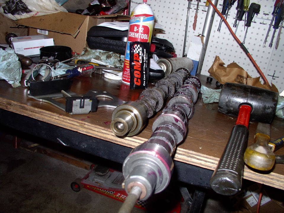 Comp Cams lube all over the lobes of the new RV cam. A long water pump bolt inserted into the cam to use as a handle. You have to steal the woodroffe key out of the old cam BTW.