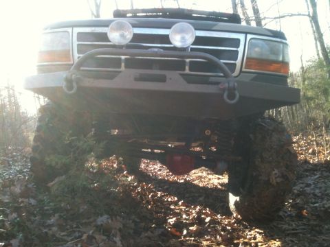 1995 Ford Bronco - This 1995 Ford Bronco is equipped for off-road adventures with its lifted suspension and bumper.