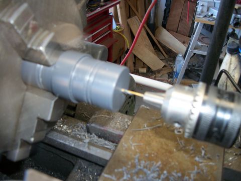 1996 Ford Bronco - Machining a part on a lathe with a drill bit.