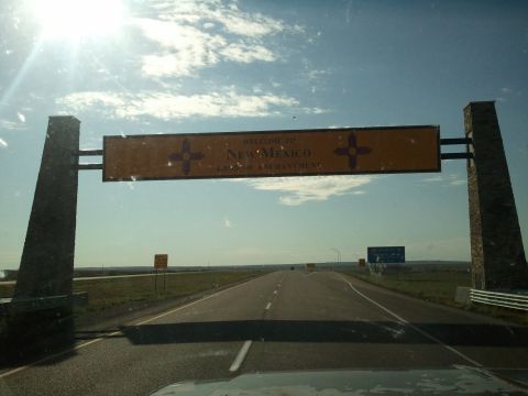 1989 Ford Bronco - Entering New Mexico on a sunny day, passing under the state welcome sign.