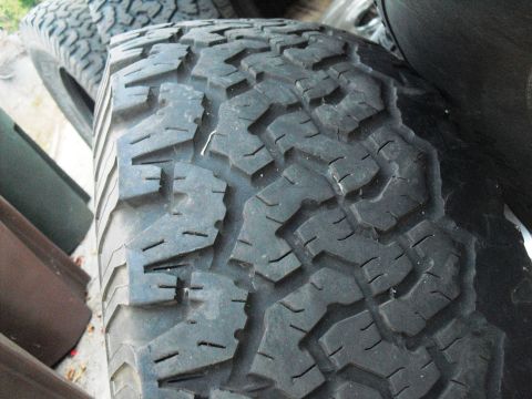 1986 Ford Bronco - Close-up of a BFGoodrich All-Terrain T/A tire tread pattern.