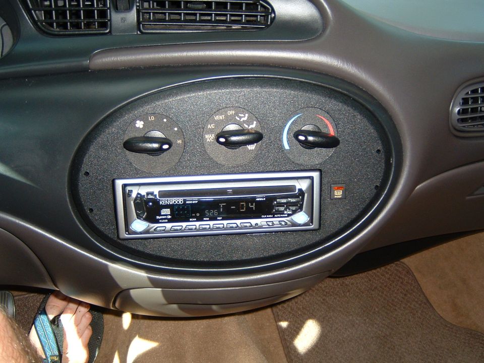 1997 Ford Taurus interior showing dashboard, climate controls, and Kenwood stereo