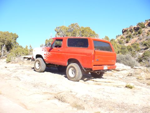 1979 Ford Bronco - This 1979 Ford Bronco is shown in a desert landscape with custom flame paint on the hood.