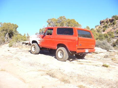 1979 Ford Bronco - This Ford Bronco appears to be from the late 1970s, possibly a 1978 model, with custom flame graphics.