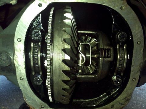 1993 Ford Bronco - The internal workings of a vehicle's differential are exposed, showing the gears and lubrication.