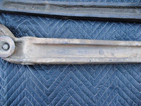 1986 Ford Bronco - Close-up of a Ford part showing casting numbers D1UA-9-AA and the Ford logo.