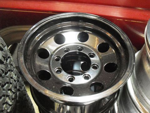 1986 Ford Bronco - Close-up of a chrome wheel rim, likely for a truck or SUV.
