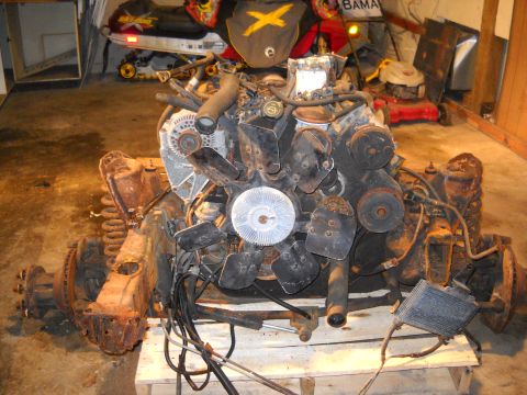 1988 Ford F-250 - Engine and front axle assembly from a truck, disassembled and ready for rebuild.