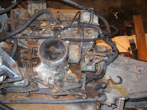 1988 Ford F-250 - Close-up view of a corroded engine, likely undergoing a rebuild.